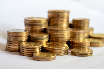 Piles of Nepal Rupee Coins
