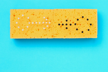 Abstract signs of man and woman made by needles in sponges for washing dishes, the concept of...