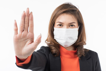 Business female in suit wearing mask