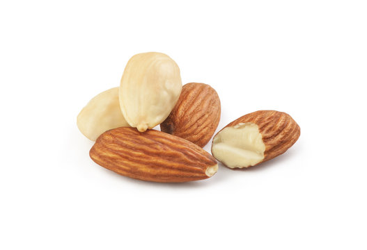 handful of almonds on a white background