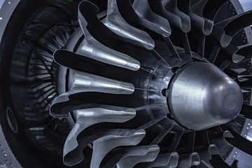 Turbine Engine. Aviation Technologies. Aircraft jet engine detail during maintenance. Blue toned.