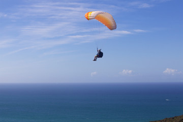extreme paraglider over the beach, Brazil.