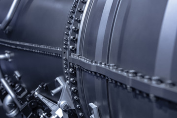 Obraz premium Turbine Engine. Aviation Technologies. Aircraft jet engine detail during maintenance. Blue toned.