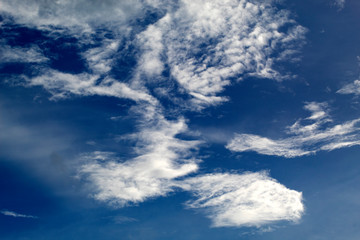 white cloulds on the blue sky