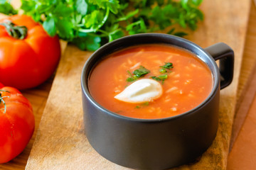Tomato soup with rice in a dish