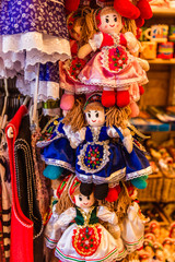 Traditional magyar dolls puppets in folk costume traditional Hungarian clothing in Market in Buda...