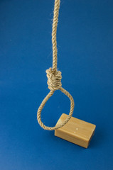 Gallows hanging rope knot tied noose and soap bar. Suicide concept