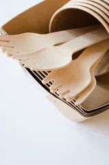Tuinposter Eco-friendly biodegradable cardboard or paper dishes. Zero waste recycling concept. © LunaLu