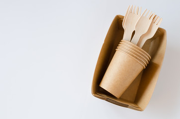 Plakat Eco-friendly biodegradable cardboard or paper dishes. Zero waste recycling concept.
