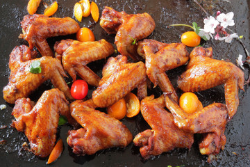  chicken wings baked in the oven with sospetsii, herbs and soy sauce.