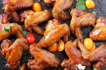  chicken wings baked in the oven with sospetsii, herbs and soy sauce.