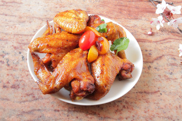  chicken wings baked in the oven with sospetsii, herbs and soy sauce.