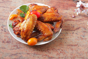  chicken wings baked in the oven with sospetsii, herbs and soy sauce.