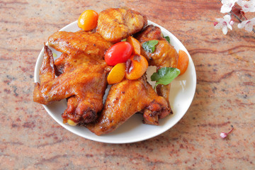  chicken wings baked in the oven with sospetsii, herbs and soy sauce.