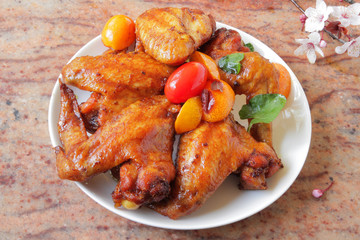  chicken wings baked in the oven with sospetsii, herbs and soy sauce.