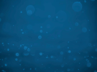 Fototapeta na wymiar blue background with soft bokeh lights.