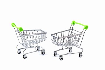 An empty grocery cart from a supermarket. There is a shortage of products in the store due to the coronavirus epidemic. Quarantine and isolation of the population in cities of many countries.