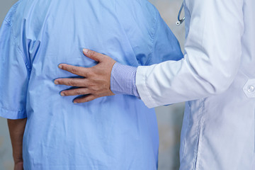 Doctor  touching Asian senior or elderly old lady woman patient with love, care, helping, encourage...