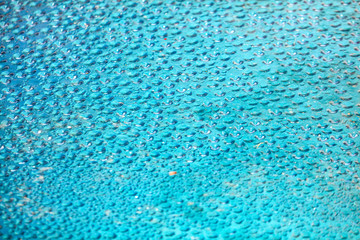 Drops of water on a blue background