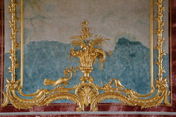 Luxury golden decor with birds on the marble wall at the Museum.