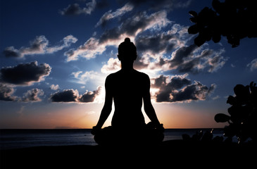 Serenity and yoga practicing in twilight sunset time, meditation