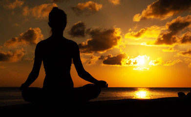 Serenity and yoga practicing in twilight sunset time, meditation