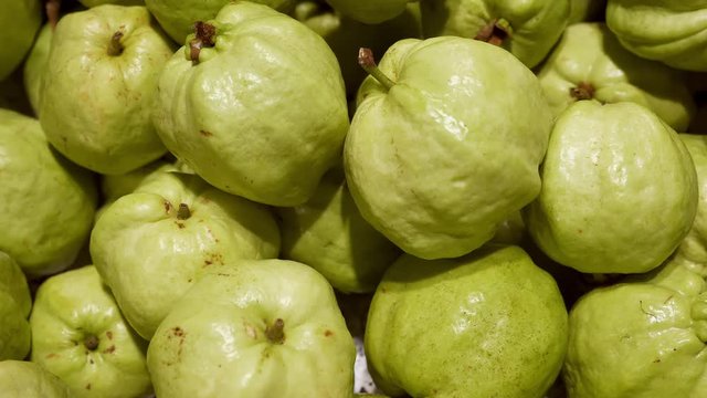 Closeup of Fresh Guava Fruit on Supermarket Shelve. Box with Guava Stack in Market in Thailand