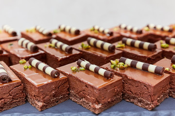 chocolate cakes on a black slate close up