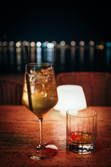 Glasses on a table, low light
