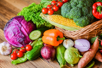 Composition with assorted raw organic fresh vegetables. Assortment of fruits and vegetable. Healthy raw detox food diet concept.