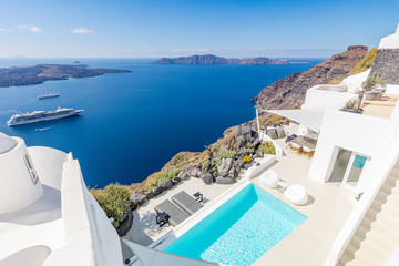 Luxury summer landscape with swimming pool with sea view. White architecture on Santorini island, Greece. Tranquil travel background with white architecture