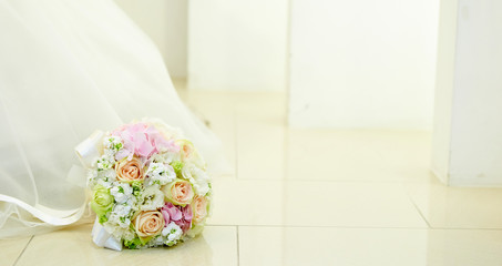 Flower bouquet with wedding dress