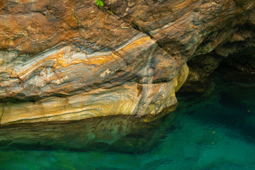 Taroko Pavilion Scenic Area, Hualien, Taiwan, with colorful rock walls and turquoise streams in Shakayu Creek