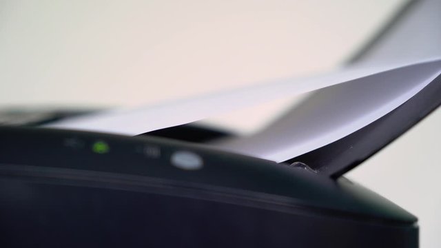 Printer printing documents or contracts in office, business concept