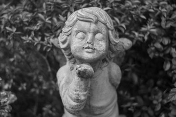 Stucco doll, Cupid, the god of conveying love in Western beliefs	