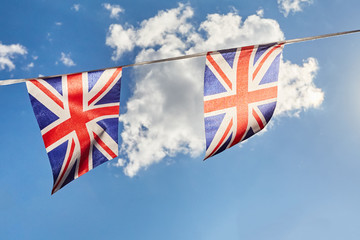 British Union Jack bunting flags against sky