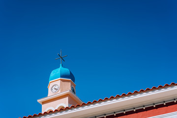 Church tower against blue sky on Kefalonia island, Greece. Summer vacation season