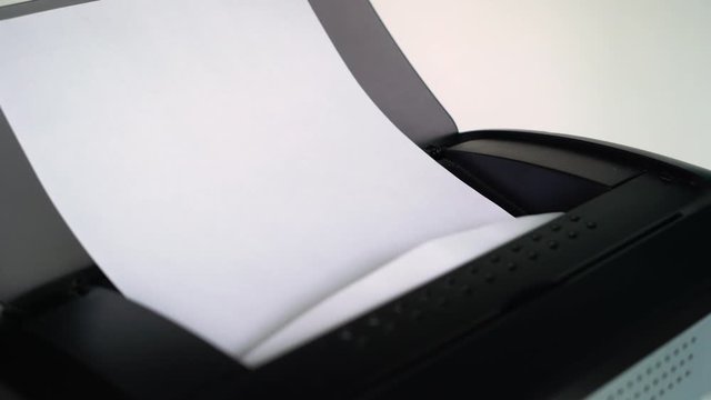 Printer printing documents or contracts in office, business concept