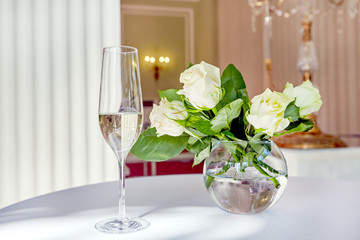 Glass of white wine stay on the table