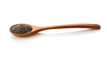 Сhia seeds in a spoon isolated on white background
