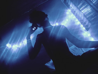 silhouette of a man dancing in nightclub