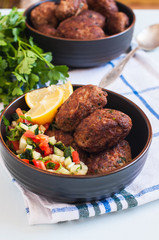Fried minced meat kofta or kebab in a bowl.