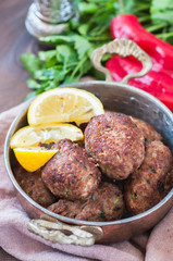 Fried minced meat kofta or kebab in a bowl.