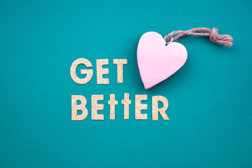lettering phrase get better. letters from gold with heart Perfect for recovery wishes greeting cards