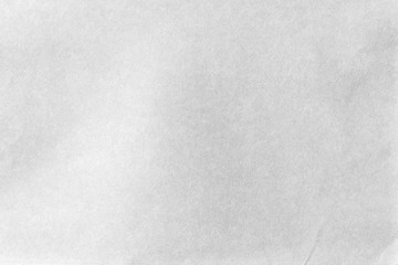 Crumpled dark grey paper background texture