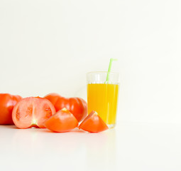 red ripe tomatoes on a white background