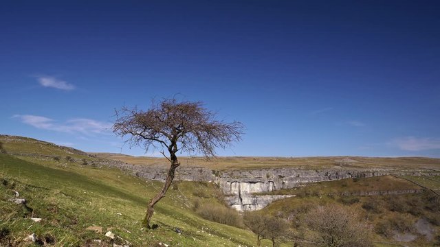 4k footage of Malham Cove a limestone landmark in the Yorkshire Dales National Park, UK