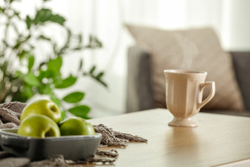 Table background in home interior and blurred window space 