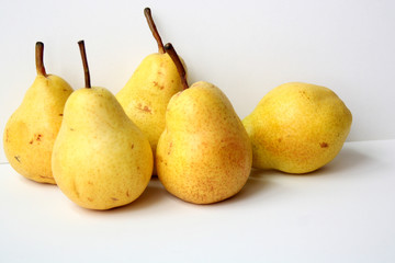 Sweet ripe pears on a white background.