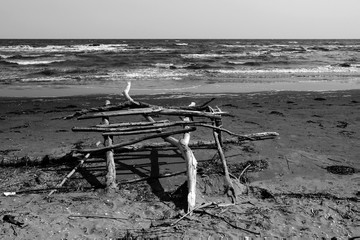Rough sea with deserted shore